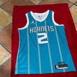 Jordan Hornets Teal Jersey with White Accents